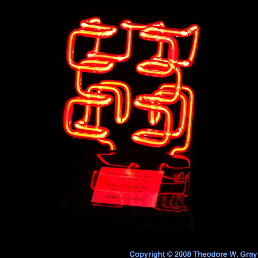 Neon fractal sculpture, a sample of the element Neon in the Periodic Table