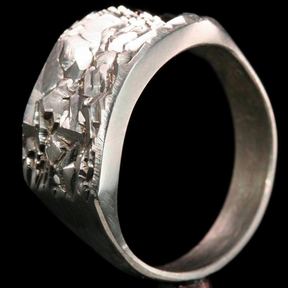 Crystal ring, a sample of the element Titanium in the Periodic Table