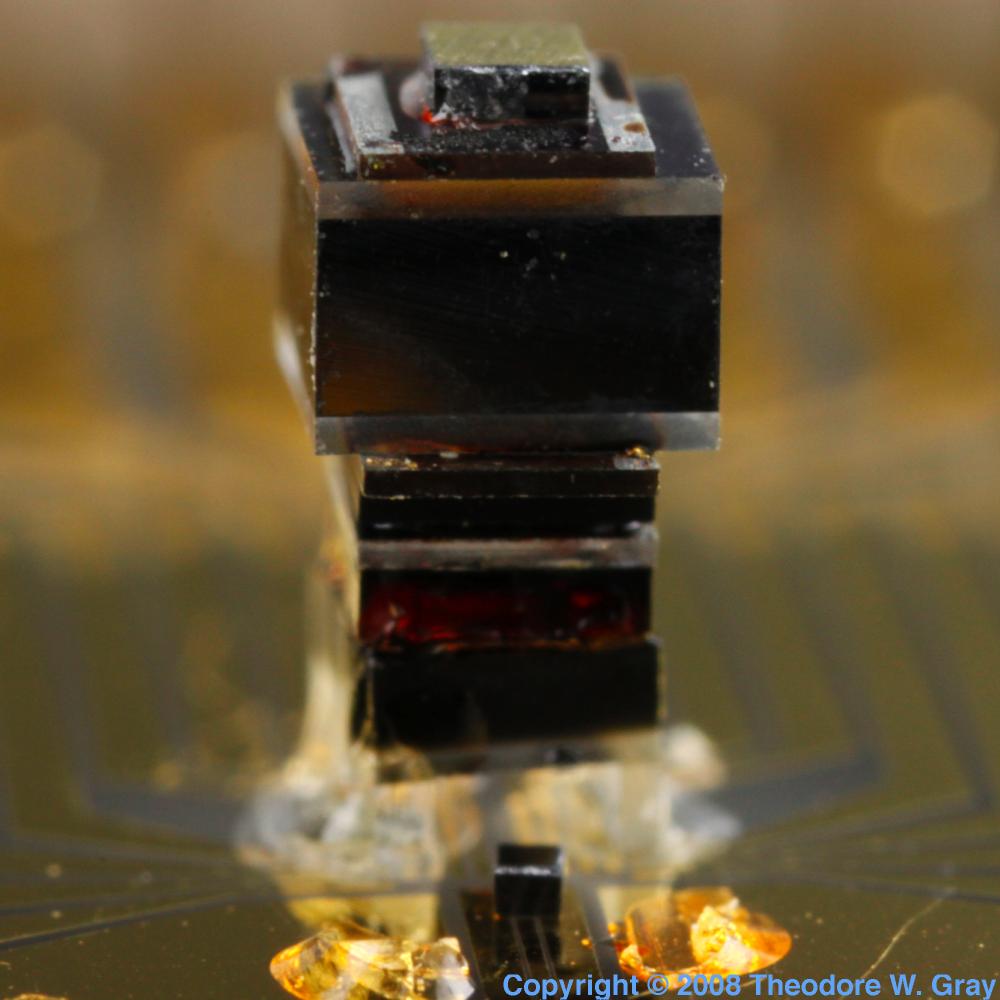 Cesium atomic clock closeup, a sample of the element Cesium in the