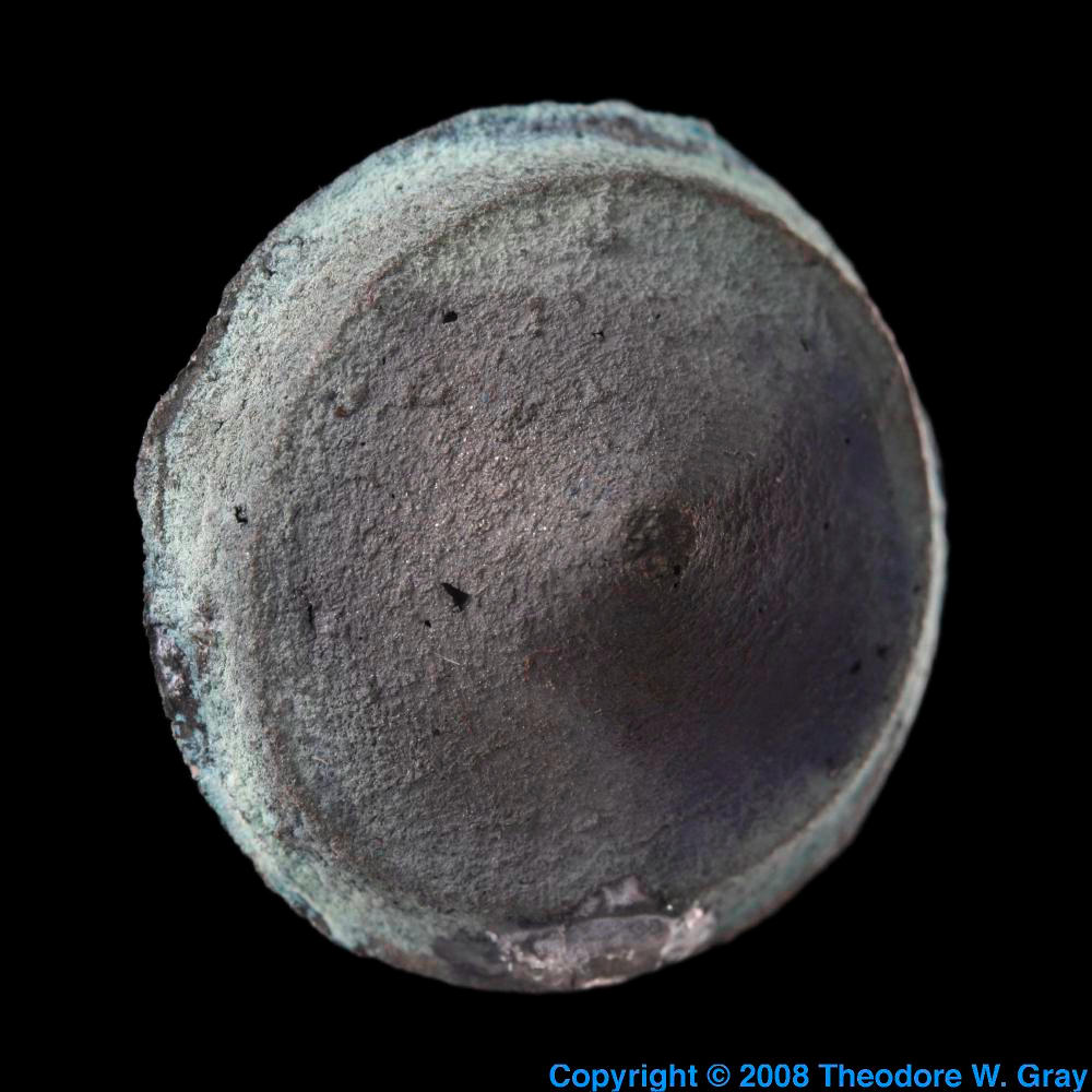 Raw tungsten carbide pellet, a sample of the element Tungsten in the